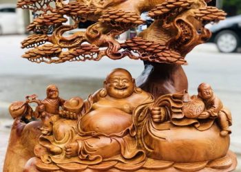 tượng gỗ phong thủy Phật Di Lặc thích hợp đặt ở góc Tài lộc